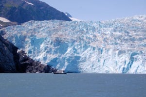 Ship next to Alaskan glaciers.