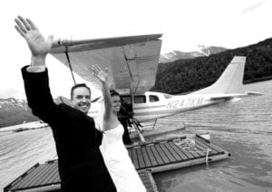 Bride and Groom entering a seaplane