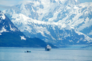Cruise ship near Alaska mountains.